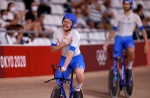 Italy's Simone Consonni reacts after winning gold and setting a new World Record in the men's track cycling team pursuit finals during the Tokyo 2020 Olympic Games at Izu Velodrome in Izu, Japan, on August 4, 2021. (Photo by Odd ANDERSEN / AFP)