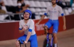 Italy's Simone Consonni reacts after winning gold and setting a new World Record in the men's track cycling team pursuit finals during the Tokyo 2020 Olympic Games at Izu Velodrome in Izu, Japan, on August 4, 2021. (Photo by Odd ANDERSEN / AFP)