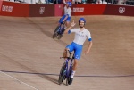 Italy's Filippo Ganna celebrates after winning gold and setting a new World Record in the men's track cycling team pursuit finals during the Tokyo 2020 Olympic Games at Izu Velodrome in Izu, Japan, on August 4, 2021. (Photo by Odd ANDERSEN / AFP)