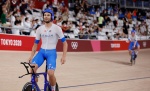 Italy's Filippo Ganna celebrates after winning gold and setting a new World Record in the men's track cycling team pursuit finals during the Tokyo 2020 Olympic Games at Izu Velodrome in Izu, Japan, on August 4, 2021. (Photo by Odd ANDERSEN / AFP)