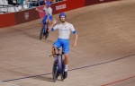 Italy's Filippo Ganna celebrates after winning gold and setting a new World Record in the men's track cycling team pursuit finals during the Tokyo 2020 Olympic Games at Izu Velodrome in Izu, Japan, on August 4, 2021. (Photo by Odd ANDERSEN / AFP)