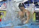 epa10022443 Nicolo Martinenghi of Italy celebrates after winning the men's 100m Breaststroke final of the Swimming events at the 19th FINA World Aquatics Championships in Budapest, Hungary, 19 June 2022. EPA/Tamas Kovacs HUNGARY OUT