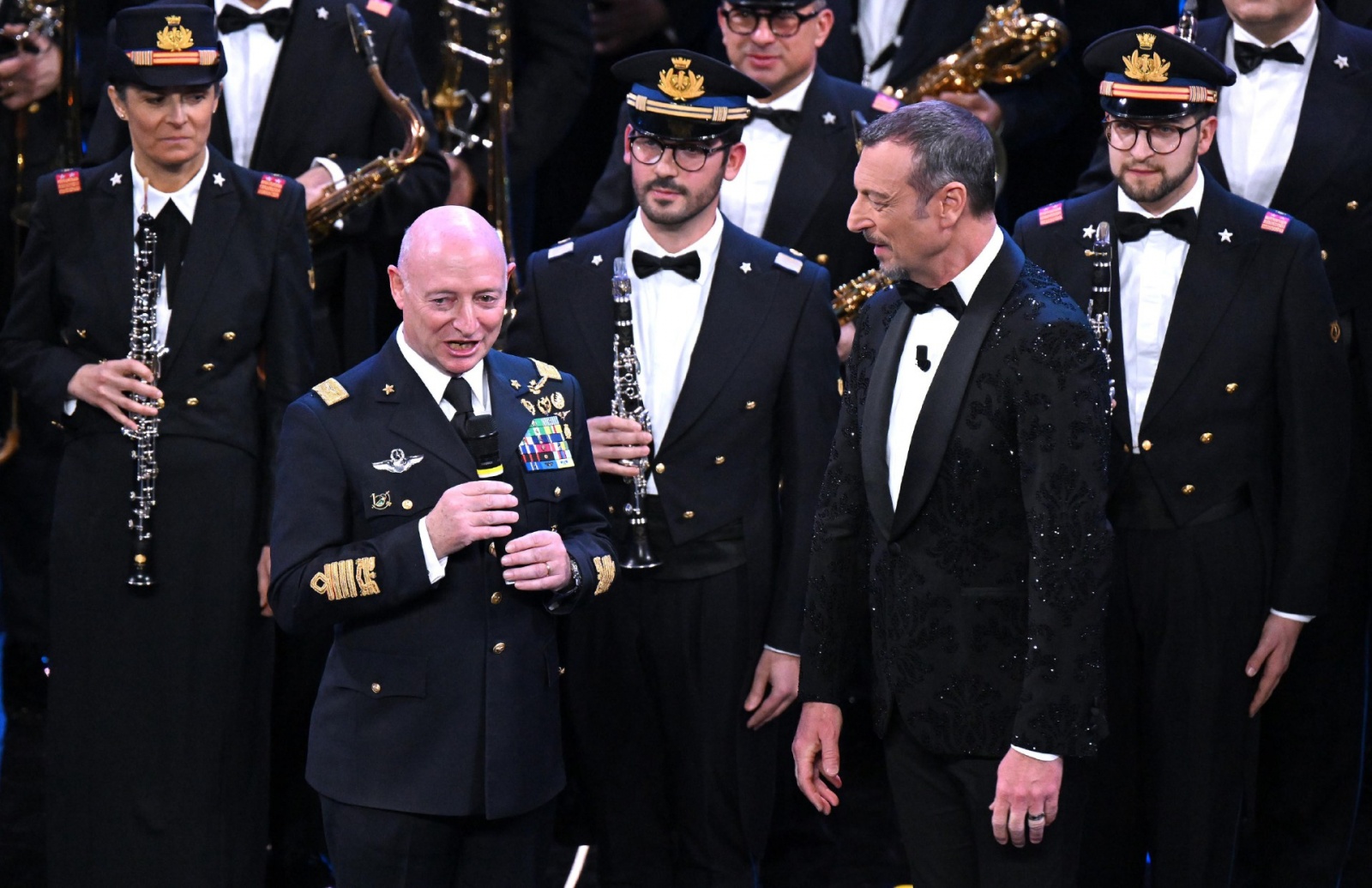 Sanremo Festival host and artistic director Amadeus, with National Air Force General Goretti and National Air Force band members on stage at the Ariston theatre during the 73rd Sanremo Italian Song Festival, in Sanremo, Italy, 11 February 2023. The music 