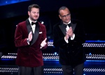 (L-R) Italian Tv presenter Alessandro Cattelan and Sanremo Festival host and artistic director Carlo Conti on stage at the Ariston theatre during the 75th edition of the Sanremo Italian Song Festival, in Sanremo, Italy, 15 February 2025. The music festiva