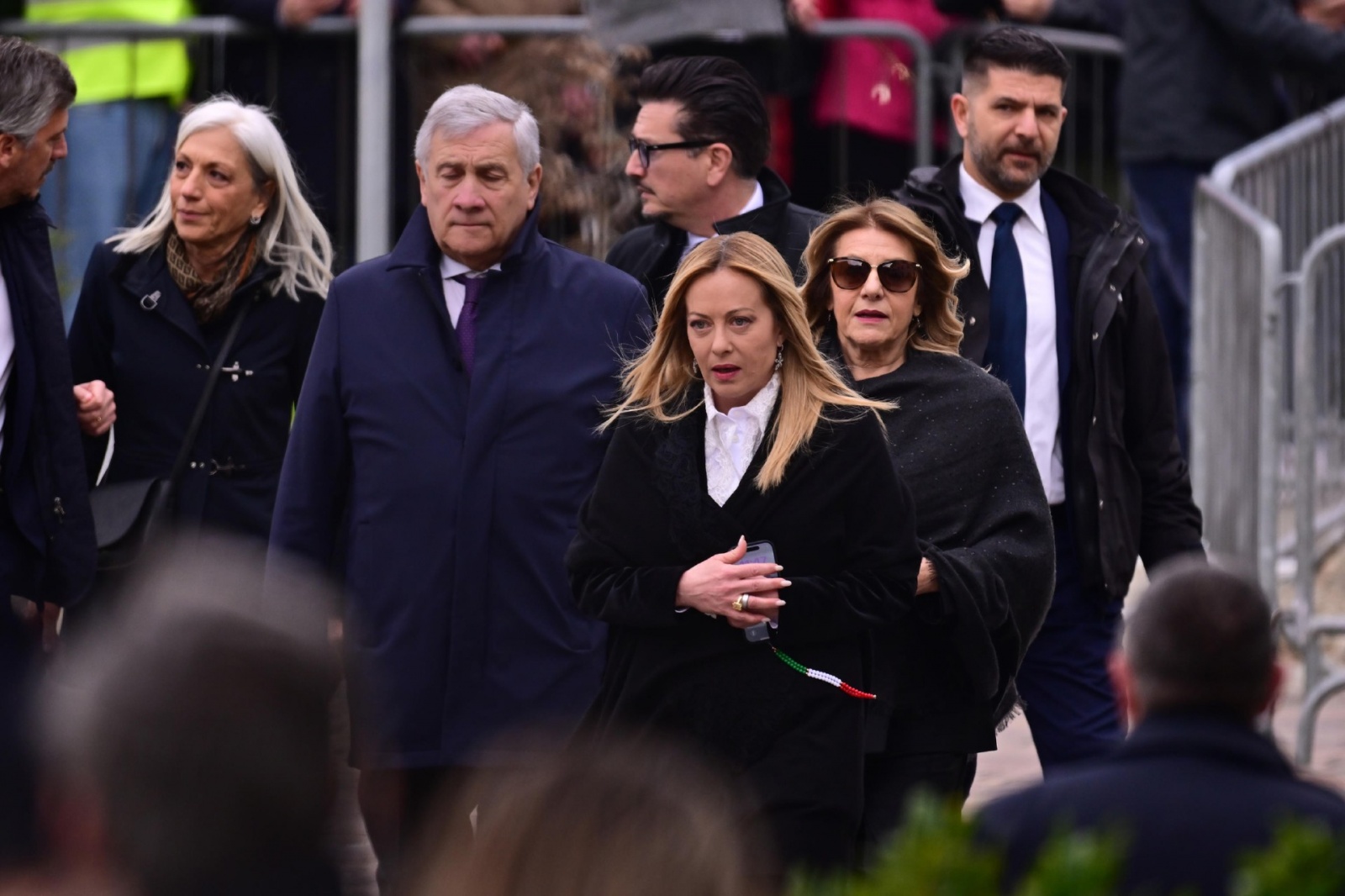 Italian Prime Minister Giorgia Meloni (C) and Italian Deputy Prime Minister and Foreign Minister Antonio Tajani attend the funeral of the Lega Nord party founder Umberto Bossi, in Pontida, Italy, 22 March 2026. The Lega Nord founder died on 19 March 2026,