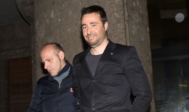 Marco Manfrinati mentre viene portato in carcere  (foto Angelo Puricelli)