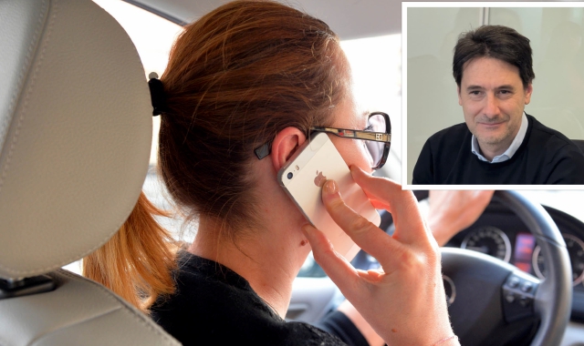 Automobilista la telefono e nel riquadro il consigliere regionale Giuseppe Licata