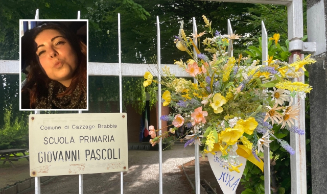I fiori e la scritta “Grazie Nika” lasciati sul cancello della scuola primaria “Pascoli” di Cazzago Brabbia (foto Blitz)